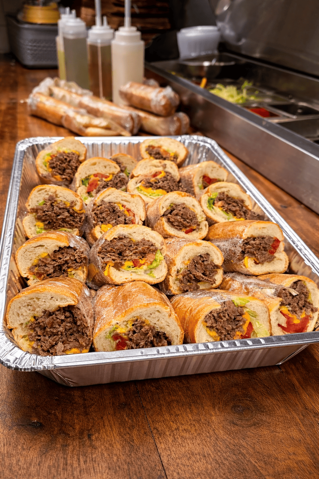 Deli and wrap trays from Pizza Sauce Timonium prepared fresh on Liscio’s bakery rolls for catering events near Towson, Timonium, and Hunt Valley