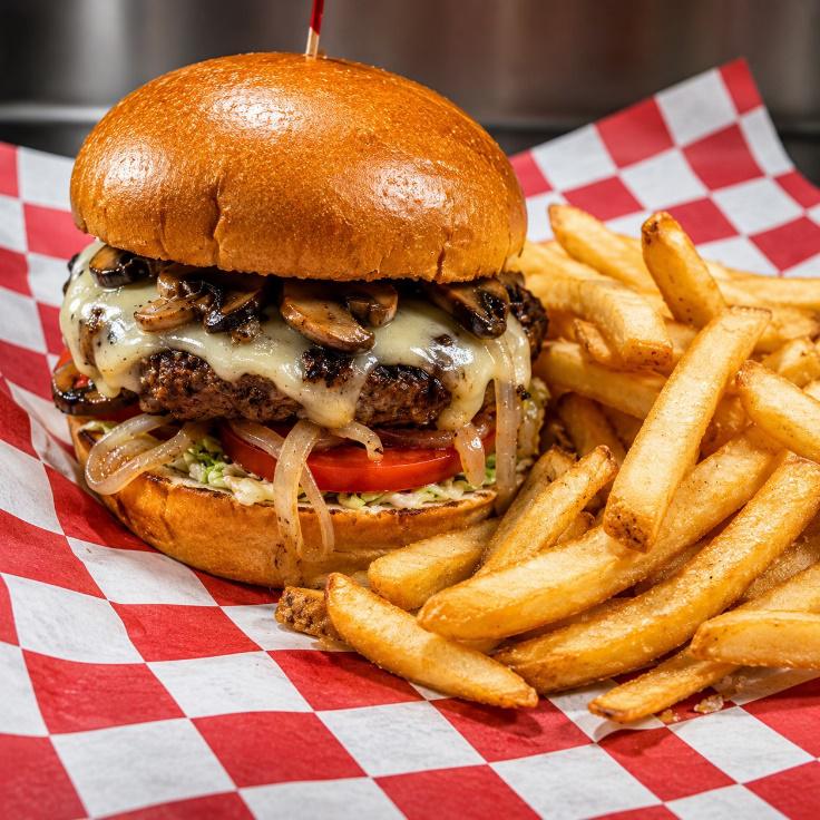 Freshly grilled cheeseburger and French fries served hot at Pizza sauce Timonium, your go-to spot for lunch and dinner in Lutherville, Cockeysville, Hunt Valley and Towson.
